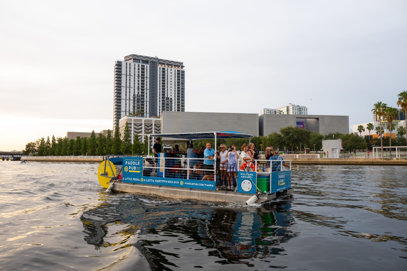Guests aboard a Paddle Pub Tampa party boat cruise